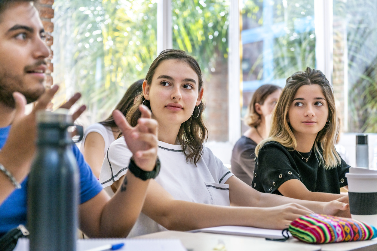 Students interact in class